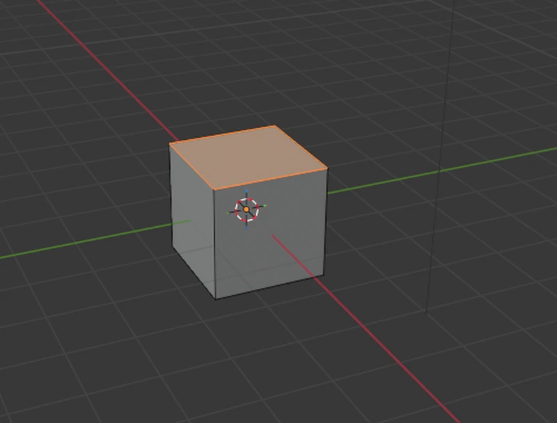 A cube in Edit Mode with its top face selected, highlighted in orange